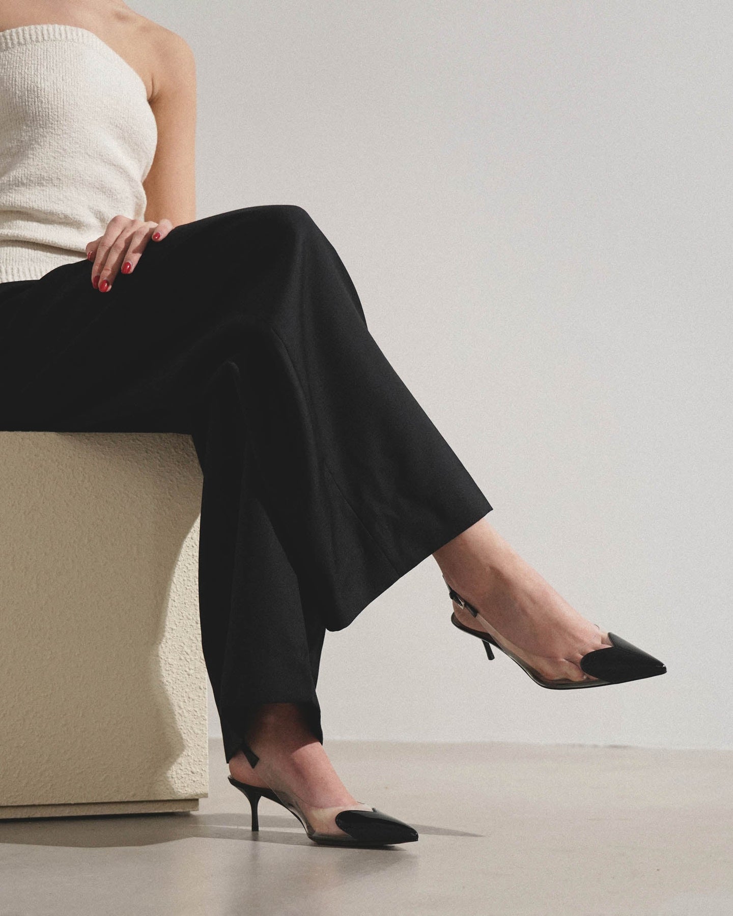 Shop Alaïa Coeur 55 Black Patent Slingbacks